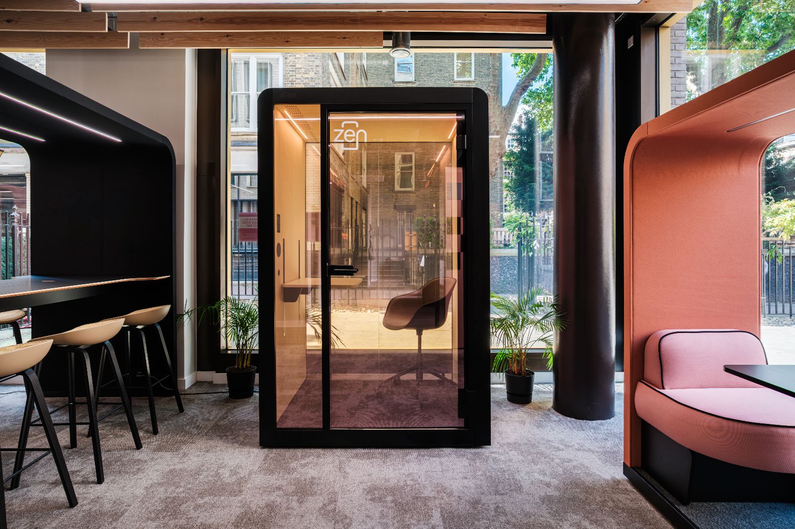 Silen Zen work pod 1.5 with the smart glass clear, front view in a showroom